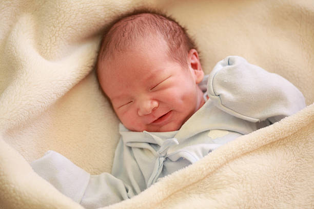 Baby Little Boys Smiling Dimple Stock Photos, Pictures & Royalty-Free  Images - iStock