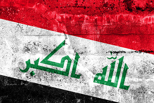 istock Iraq Flag painted on grunge wall 513160361