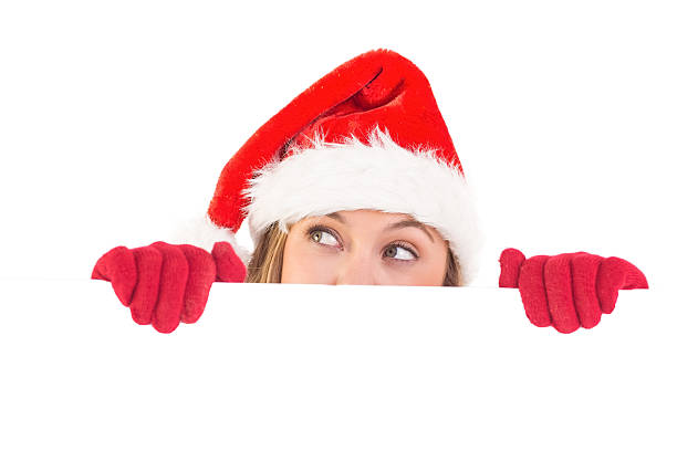 istock Festive blonde holding a poster 513166197