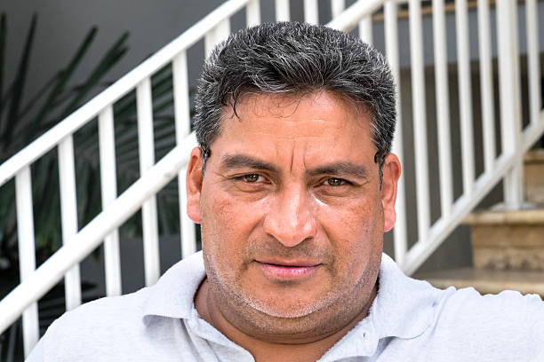 istock Forty something hispanic mature man 513184411