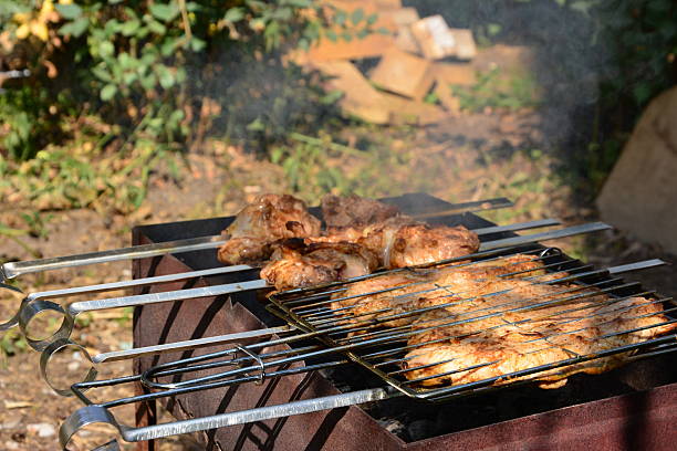 Preparation, Cooking kebabs on charcoal outdoor