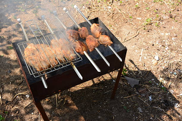 Preparation, Cooking kebabs on charcoal outdoor