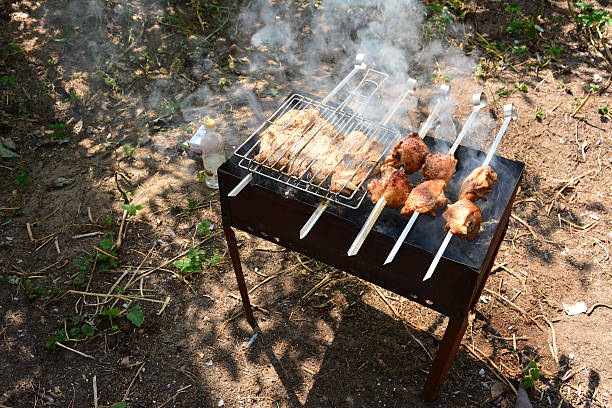 Preparation, Cooking kebabs on charcoal outdoor