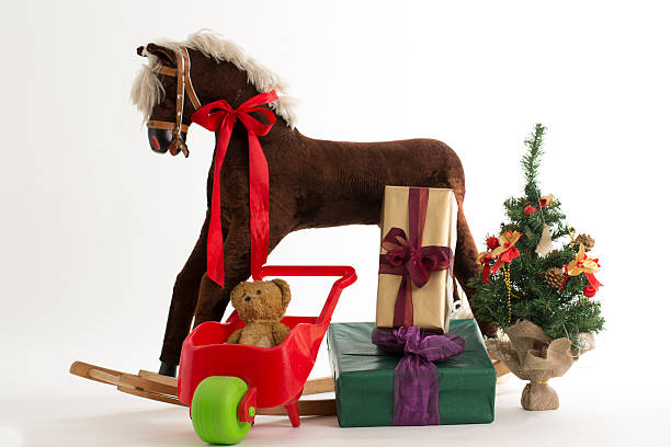 istock rocking horse and gift 513204285