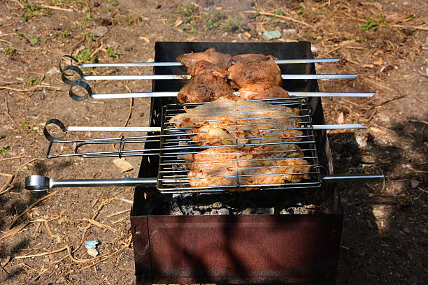 Preparation, Cooking kebabs on charcoal outdoor