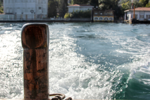 This image shows Kanlica shoreline, as pictured from the rear of a water taxi.