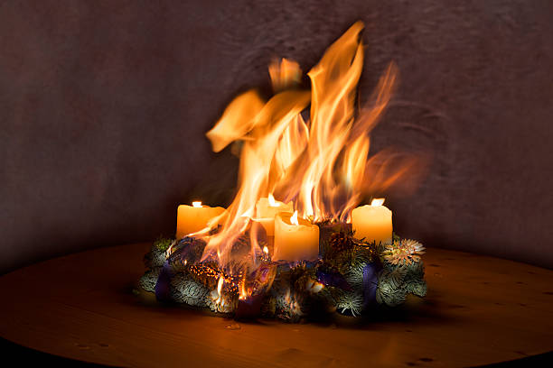 Advent wreath caught fire Advent wreath caught fire , got burned advent candle wreath adventskranz stock pictures, royalty-free photos & images