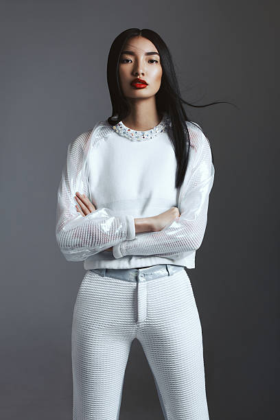 Fashionable Asian woman Beautiful asian woman wearing trendy white suit. Professional make-up and hairstyle. High-end retouch. fine art portrait photos stock pictures, royalty-free photos & images