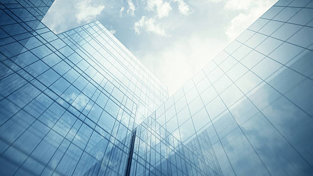 Skyscraper's exterior Blue clean glass wall of modern skyscraper skyscrapers stock pictures, royalty-free photos & images