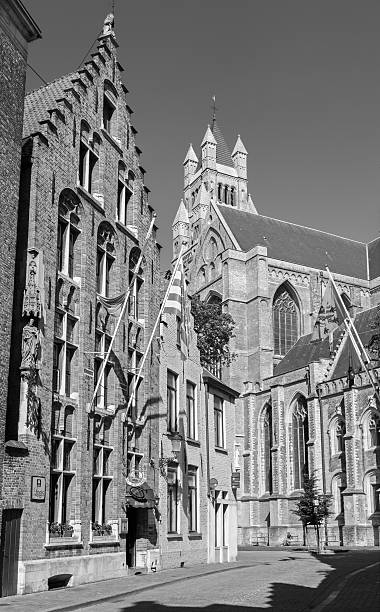 Bruges - St. Salvator's Cathedral and the old gothic house Bruges, Belgium - June 12, 2014: St. Salvator's Cathedral (Salvatorskerk) and the old gothic house from south-east. st salvator's cathedral stock pictures, royalty-free photos & images