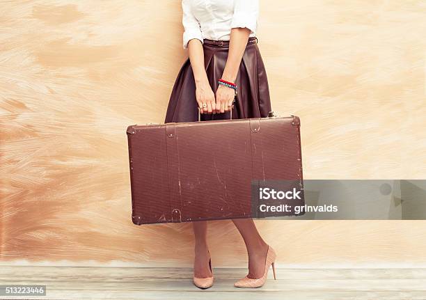 Woman Holding Antique Suitcase For Traveling Stock Photo - Download Image Now - Suitcase, Women, Retro Style