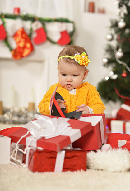 istock girl near Christmas tree 513223494