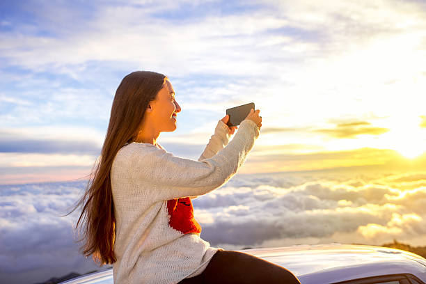 istock Woman enjoying beautiful cloudscape 513223864