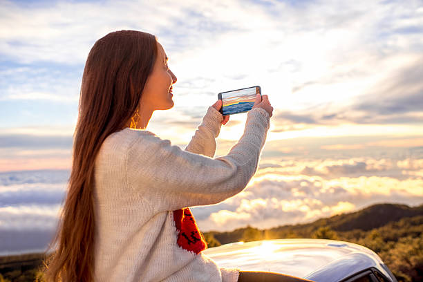 istock Woman enjoying beautiful cloudscape 513223900