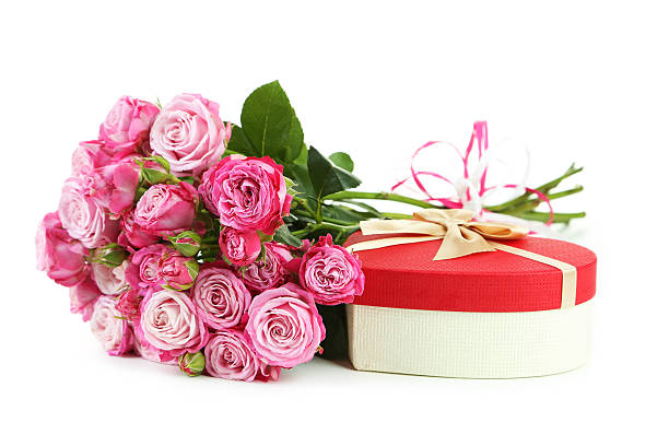 istock beautiful pink rose with gift box isolated on white 513224900