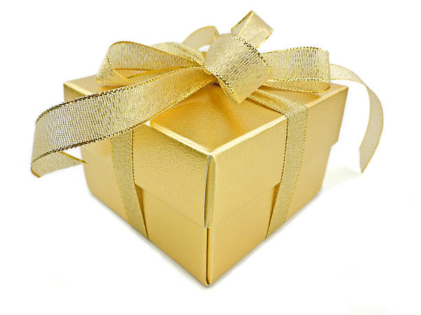 istock Golden gift box with golden ribbon 513226603