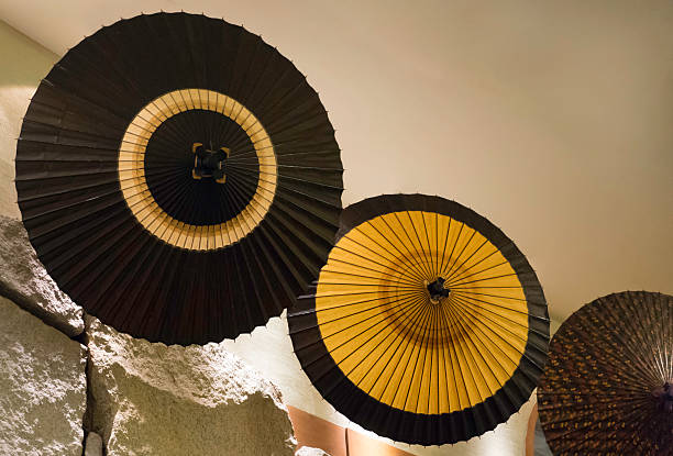 istock Japanese Paper Umbrella hanging on the wall 513228308