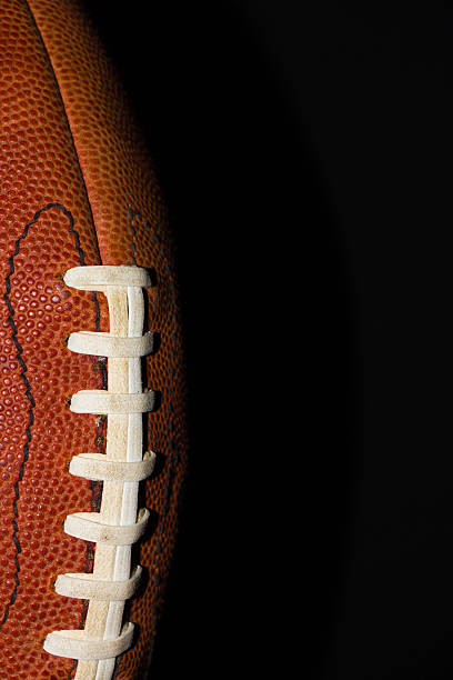 istock American Football on black 513229323