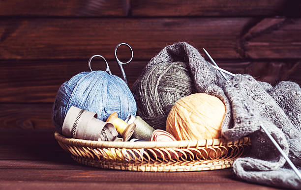 istock knitting, tangles scissors and coils in a basket 513229472