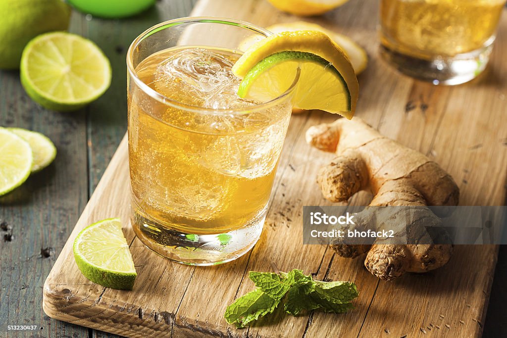 Organic Ginger Ale Soda Organic Ginger Ale Soda in a Glass with Lemon and Lime Ginger Ale Stock Photo