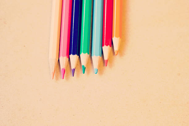 istock Bright color pencils on a light pastel background 513230482