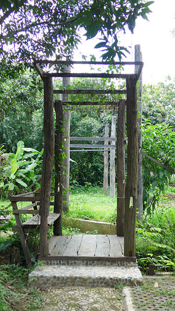 istock Wooden Teak Chairs in Garden 513230683