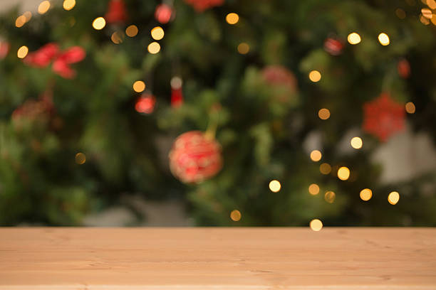 istock Desk with christmas tree in background 513230811