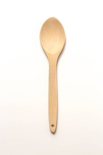 Wood spoon white background stock photo