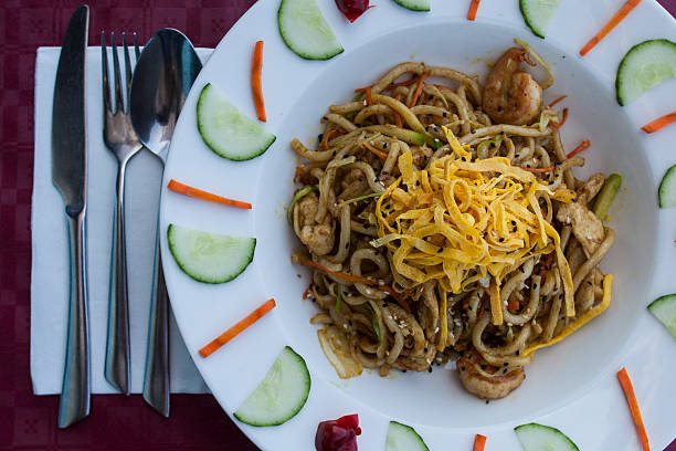 istock Chinese noodles with omelette and vegetables 513231636