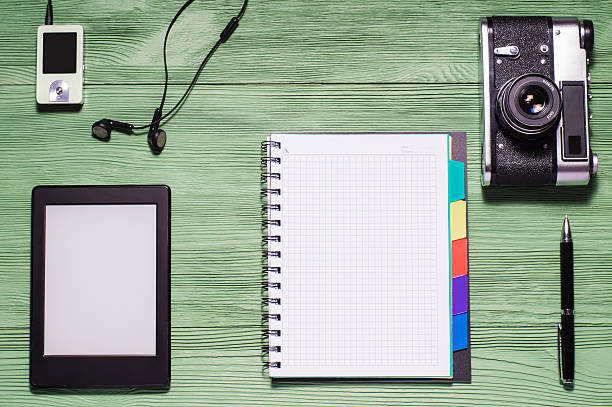 istock Flat lay of personal stuff, tablet pc, camera photo,notebook 513232064
