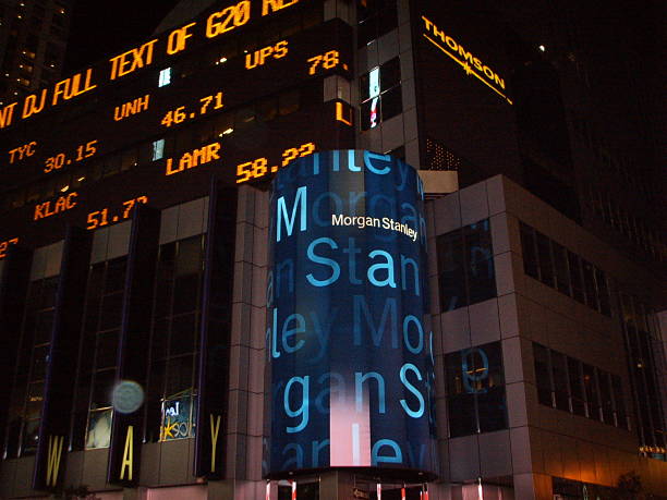 Morgan Stanley Headquarters Building in New York. New York, NY, USA - January 26, 2007: Morgan Stanley Headquarters Building with Digital Display on Times Square in Manhattan with Light Orb at Night. ticker tape machine stock pictures, royalty-free photos & images