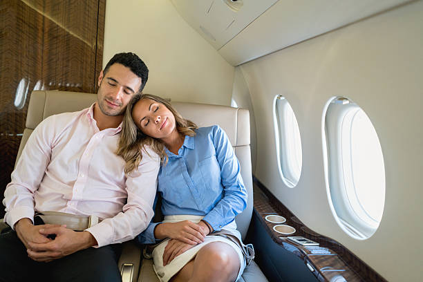 istock Loving couple traveling in business class 513232080