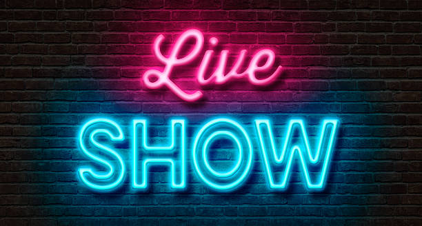 istock Neon sign on a brick wall - Live Show 513233074