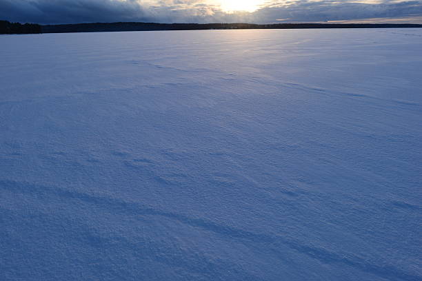 istock Blue blue snow lake at sunset winter sun 513235510