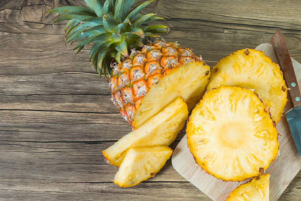 pineapple on the wood texture background