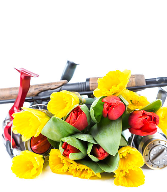 istock fishing tackles with spring flowers 513244122
