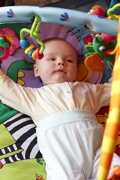 istock Baby is lying on bassinet 513246844