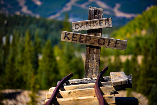 Danger sign at the end of a coal mining railway in Colorado.