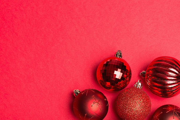 istock Shiny red group of christmas baubles 513251095