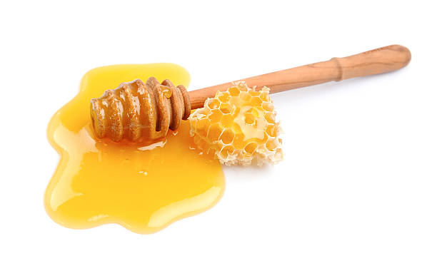 istock Honey dipper with honeycomb 513251974