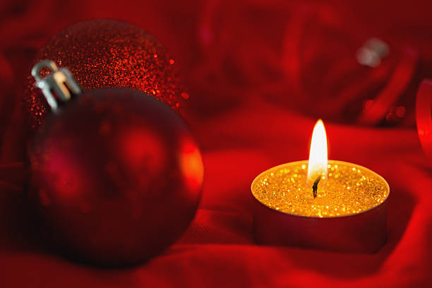 istock Golden tea light candle with christmas decorations 513253061