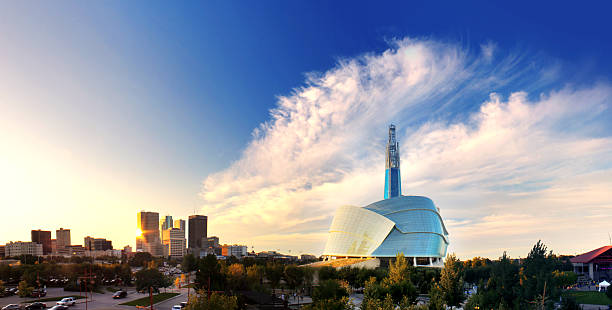 Winnipeg Skyline Winnipeg skyline as seen from The Forks. The Human Rights Museum is on the right. Picture taken on September 6, 2014. winnipeg photos stock pictures, royalty-free photos & images
