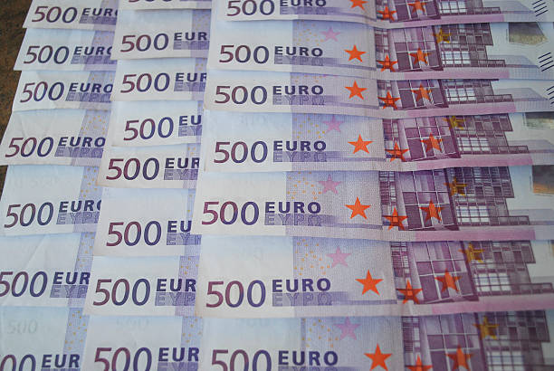 istock Cash Euro banknotes spread out on the table. 513253674