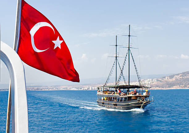Turkish flag on a boat and a ship