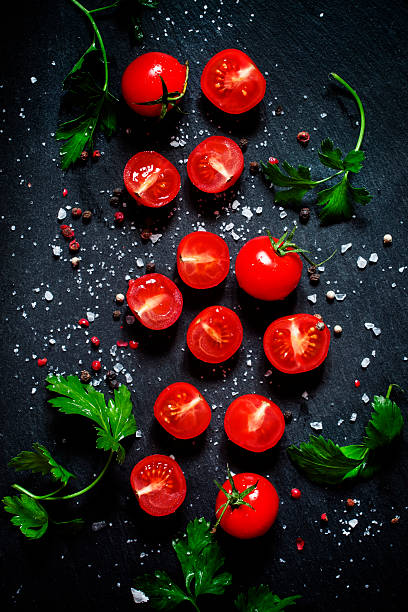 istock Food background, sliced and whole cherry tomatoes 513254072