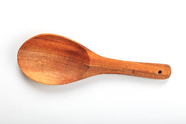 istock Wooden spoon isolated on white background 513256067