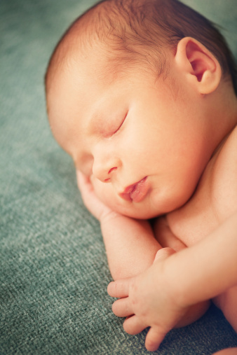 Vertical Portrait Of Newborn Baby Sleeping Stock Photo - Download Image Now - 0-1 Months, 0-11 Months, Babies Only - iStock