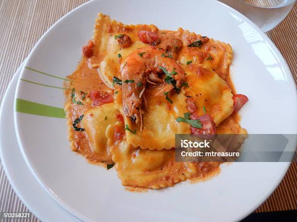 Image Of Seafood Ravioli Pasta Rich Tomato Sauce King Prawn Stock Photo - Download Image Now