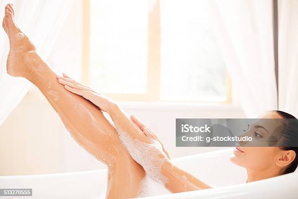 Taking Good Care Of Her Skin Stock Photo - Download Image Now - Adult, Adults Only, Barefoot