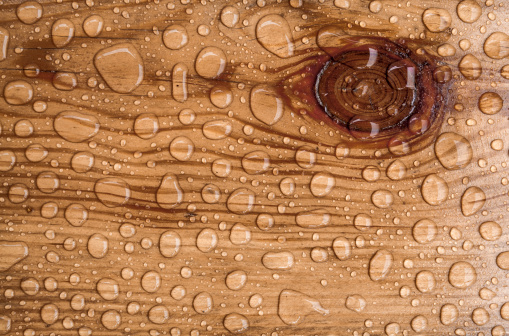 water drop on a wooden background